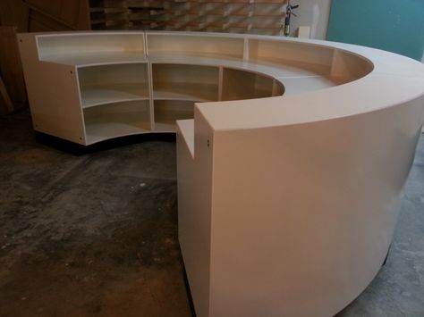 Kinda storage we are looking for under back of bar. Just not that much curve and need doors at bottom. Curved Coffee Bar, Half Circle Bar Table, Curved Wall Bar Design, Rounded Bar Design, Round Bar Counter Design, Curved Bar, Boutique Counter Ideas, Rounded Bar Counter, Curved Bar Counter