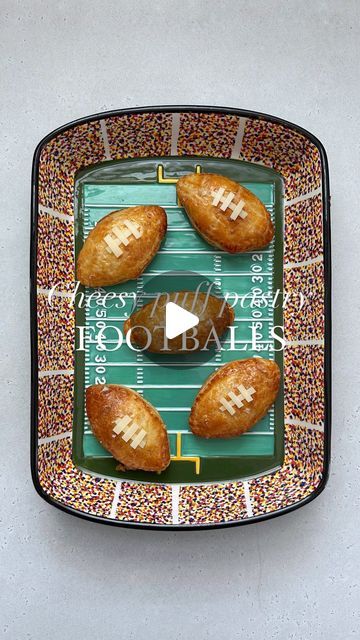 Sarah Fowler on Instagram: "These cheesy puff pastry footballs are the perfect snack for the games this weekend! 🏈 Ingredients 1 sheet frozen puff pastry, thawed 1 package @boursincheese 1 egg Flake salt Sliced provolone cheese Preheat oven to 400°. Roll out the thawed puff pastry and use a football shaped cookie cutter to cut out 10 pieces. Lay 5 of them on a parchment lined baking sheet and spoon a bit of Boursin cheese in the middle. Top with another piece of puff pastry and use a fork to seal the edges. Brush with a beaten egg and sprinkle with flake salt. Bake for 12-15 minutes until golden brown. Let cool for about 10 minutes. Cut small strips out of the provolone cheese slices and use them to create “laces” for your little footballs. Enjoy! #football #puffpastry #kidfriendlyrecip Cheesy Puff Pastry, Boursin Cheese, Salt Flakes, Frozen Puff Pastry, Provolone Cheese, Provolone, The Games, Shaped Cookie, 1 Egg