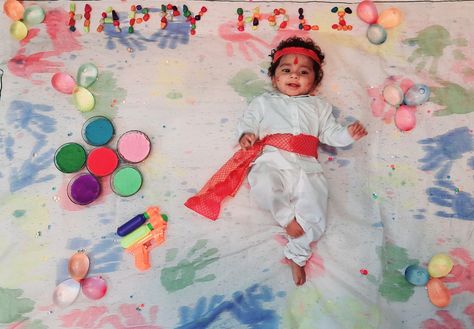 Newborn Baby Holi Photoshoot, Holi Baby Photoshoot Ideas, Holi Photoshoot Ideas For Baby Boy, Holi Baby Photoshoot, 1st Holi Photoshoot Baby, Holi Photoshoot Ideas For Kids, Holi Decorations Ideas For Baby, Holi Babyshoot At Home, Holi Special Baby Photoshoot