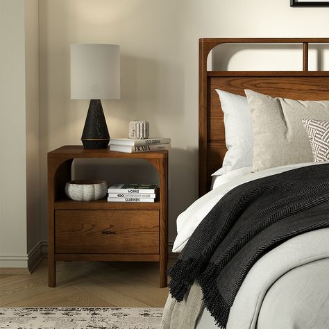 The Cali bed is crafted from solid oak wood and oak veneers. The wood is hand finished with a walnut stain, which adds a warm and rich tone to the piece, and enhances the natural grain patterns of the oak. The bed features a subtle arch detail that ties it into the rest of the bedroom collection. Wooden slats are included so it can be used without a box spring for low, modern feel. Solid Wooden Bed, Copper Top Table, Oak Bed, Oak Nightstand, Oak Beds, Wooden Bed Design, Walnut Nightstand, Outdoor Accent Table, Wooden Nightstand