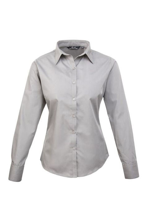 - Womens easy care long sleeve blouse. - Soft collar styling. - Rounded bottom hem. - Fitted styling with bust and back darts. - Pearlized buttons on white shirt, self colour buttons on black. - Double buttons on cuff. - US Size 4*, 6, 8, 10, 12, 14, 16, 18, 20, 22, 24 * size 4 only available in black and white. - Bust: 4 - 35.5”, 6 - 37.5”, 8 - 39.5”, 10 - 41.5”, 12 - 43.5”, 14 - 45.5” 16 - 47.5”, 18 - 49.5”, 20 - 51.5”, 22 - 53.5”, 24 - 55.5”. - Fabric 65% Polyester, 35% Cotton. - Plain Poplin Professional Uniforms, Competition Swimwear, Poplin Blouse, Plain Blouse, Short T Shirt, Chiffon Scarf, Rock Shirts, Pullover Shirt, Grey Women