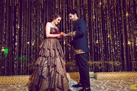 When you couple this magical moment with an even more magical decor! #couple #ring #ringceremony #engaged #engagement  #couplephotography #weddinginspo #shaadisaga #weddinginspiration #ringexchangeceremony #bride #groom #bridegroom #engagementring #weddingring #bridalring #wedding Wedding Decorations Indian Stage, Wedding Stage Decoration Ideas, Sangeet Decoration, Wedding Decorations Indian, Stage Decoration Ideas, Indian Wedding Stage, Groom Pose, Wedding Stage Decor, Stage Decoration