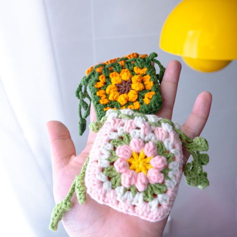 🌸🌻 Who hasn’t seen my crochet earbud cases yet? I might just be heartbroken! 🌻🌸 These super practical and stylish crochet earbud cases are the perfect gift for friends and family once you learn to make them! Thoughtful, handy, and honestly, who wouldn’t love one of these beauties in their bag? 📱 Tell me, which design is your favorite? 🌸 Pink Rose or 🌻 Sunflower? 💬 Drop a comment and tag that friend who’d love a handmade gift like this! 🔗 Want the pattern? Tap the link in my bio to get it! ... Crochet Earbud Case, Earbud Case, Stylish Crochet, T Love, For Friends, Pink Rose, Tell Me, Gifts For Friends, Tap