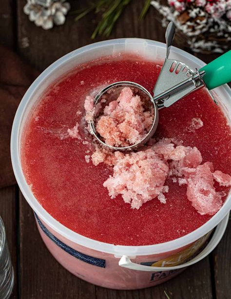 Christmas Slush Mocktail is a refreshing and festive beverage that can be enjoyed by all ages. It's made with a mixture of cranberry juice, orange juice, and lemonade concentrate, which is then frozen and served topped with cherry lemon-lime soda. Christmas Slush, Alcoholic Slush, Slush Punch, Vodka Slush, Xmas Drinks, Slush Recipes, Frozen Juice, Cranberry Vodka, Lemonade Concentrate