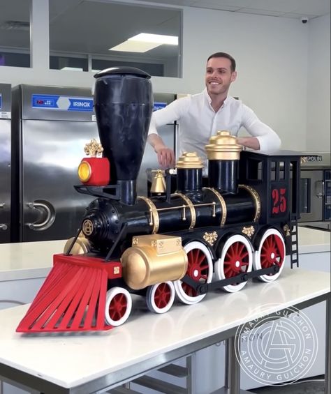 Chocolate train engine by Amaury Guichon Amaury Guichon Desserts, Amary Guichon, Chocolate Display, Amaury Guichon, Chocolate Designs, Chocolate Sculpture, Car Hat, Chocolate Sculptures, Baking Hacks