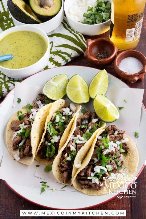 Mexican Steak tacos, or Tacos de Bistec, are among the many tacos you can enjoy on the vibrant streets of Mexico. Learn how to make these easy yet mouthwatering tacos at home. Mexican Steak Tacos, Mexican Food Recipes Beef, Tacos At Home, Steak Taco Recipe, Mexican Steak, Real Mexican Food, Traditional Mexican Dishes, Traditional Mexican Food, Steak Tacos