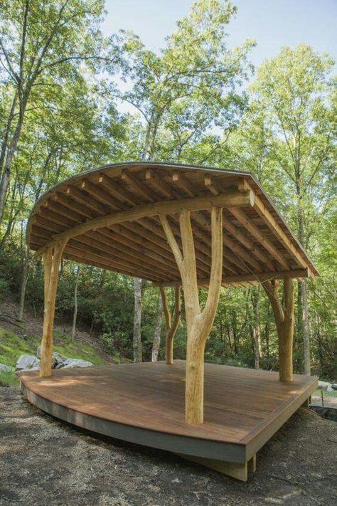 Outdoor Shelters Ideas, Wooden Roof Design, Outdoor Stage Ideas, Outdoor Shelter Ideas, Outdoor Stage Design, Tree Pergola, Outdoor Yoga Space, Outdoor Amphitheater, Rustic Pergola