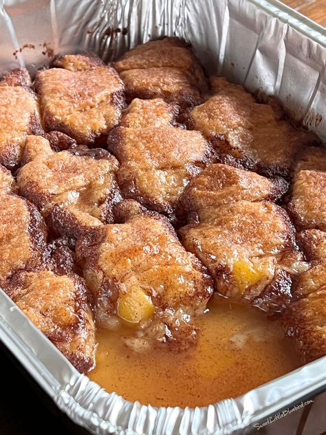 This photo shows the dumplings after baking, with one dumpling removed from the pan. Sweet Potato Dumplings Crescent Rolls, Weekend Desserts, Sweet Potato Dumplings, Crescent Roll Recipes Dinner, Easy Crescent Rolls, Peach Dumplings, Sweet Potato Dishes, Potato Dumplings, Roll Recipes