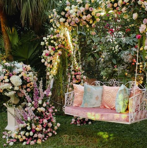 pastel haldi function theme decoration for jhula and swing with flowers Mehendi Decor Ideas, Fancy Lehenga, Mehendi Decor, Mehndi Ceremony, Seating Ideas, Desi Wedding Decor, Mehndi Decor, Wedding Design Decoration, Wedding Stage Decorations