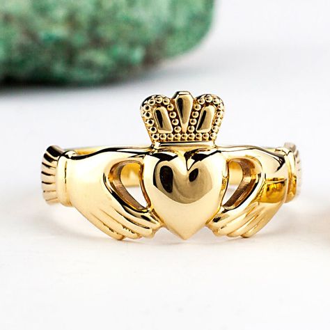 Whether you choose 9K, 14K, or 18K yellow gold, these Claddagh rings are a timeless classics. A stunning celebration of Irish culture and craft, these rings will be meticulously made for you here in Ireland.The Claddagh ring is a centuries old Irish symbol, exchanged between loved ones and sweethearts. Made to be worn every day and passed on as treasured heirlooms, the heart, crown and hands of these iconic Claddaghs represent love, loyalty and friendshipEach element in these rings has been artfully crafted from the graceful hands, to the regal crown, and the finely domed and polished heart. Heirloom pieces of lovely size and weight that are comfortable on the hand. Crafted from solid yellow gold, the perfect set to celebrate a strong connection, for a loved one or sweetheart.Make them you Love Ring Silver, Irish Ring, Meaningful Rings, Diamond Claddagh Ring, Mens Claddagh Ring, Claddagh Ring Wedding, Gold Claddagh Ring, Ring Crown, Propose Ring