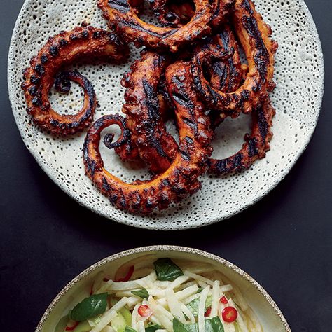 7 Best Recipes for Octopus: It may seem daunting, but octopus is worth tackling at home. Whether grilled or braised, the tender tentacles are incredibly delicious and can be served in a myriad of ways. Here, F&W's best ways to cook your new favorite cephalopod. | Food & Wine Octopus Recipes, Resep Seafood, Chile Sauce, Grilled Octopus, Seafood Dishes, Sashimi, Fish And Seafood, Easy Cooking, Potato Recipes