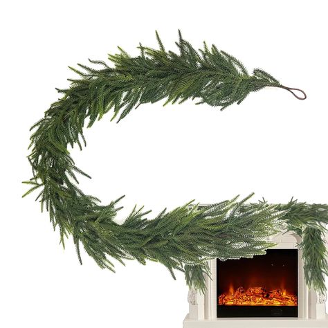 PRICES MAY VARY. Outstanding Durability: Made with soft touch and wear-resistant PVC materials, this Norfolk Pine Garland boasts outstanding workmanship and selected materials for an incredibly realistic appearance. Its excellent elasticity adds to its graceful charm, making it the perfect addition to your holiday decor Widespread Adoption: Strongly designed to decorate front doors, stair railings, and outdoor fences, this Norfolk Pine Garland effortlessly creates a festive Christmas atmosphere Vivid and Lively: Transform your space into a warm Christmas haven with this Norfolk Garland, featuring a realistic look and classic pine elements for an authentic festive atmosphere Home Beautifier: Our Norfolk Pine Garland for a stunning Christmas decoration. Its abundant greenery adds a touch of Norfolk Garland, Christmas Garland Fireplace, Christmas Decor Green, Pine Garland Christmas, Norfolk Pine Garland, Stairs Fireplace, Christmas Garland Mantle, Mantle Garland, Norfolk Pine