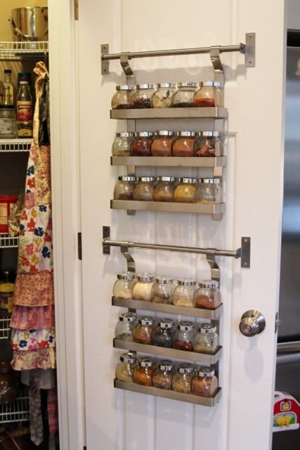 If you want to gain valuable storage space in any room, just look on the other side of your door. Use nifty storage tools to hang on the door for extra organizational space. Ikea Spice Jars, Organiser Cucina, Ikea Spice Rack, Spice Racks, Kitchen Hacks Organization, Spice Storage, Kitchen Spices, Understairs Storage, Spice Organization