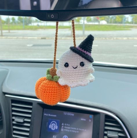 Crochet Ghost And Pumpkin Halloween Rear View Mirror Accessories Decoration, Ghost Witch Hat Plushie, Pumpkin Fall Car Decor, Halloween Gift CROCHET GHOST PUMPKIN CAR ACCESSORY Materials: These cutie ghost and pumpkin car pendant is crocheted with natural cotton yarn, soft for skin, safe eyes.  Cute ghost pumpkin car accessories a meticulously handcrafted by hand This Halloween car ornament dimension: The ghost measures 2.5 inches in tall and the pumpkin measures 1 inches in wide CUTE GIFT FOR HALLOWEEN DECOR If you are looking for a funny gifts for Halloween or you want to decor your car for Halloween, fall, autumn, this cute ghost with pumpkin car hanging will be great choice to you.  It will be lovely gift for your mom, your grandma, your daughter, girlfriend, your friend, your besties Crochet Ghost Rear View Mirror, Halloween Car Decor, Crochet Halloween Plushies, Crochet Pour Halloween, Crochet Ghost, New Car Accessories, Mirror Accessories, Ghost Witch, Crochet Car