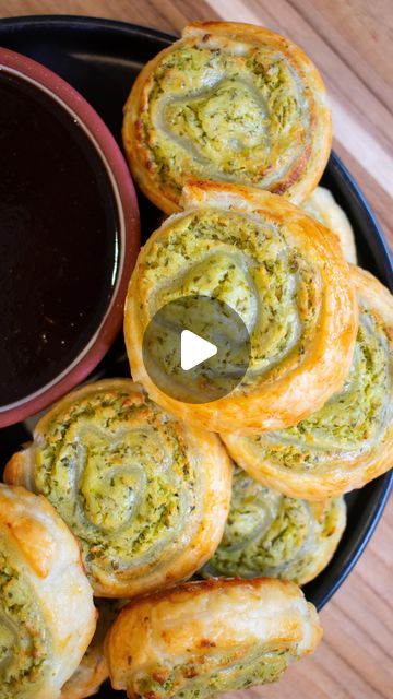 Sheena | Indian(ish) Recipes on Instagram: "Welcome back to Episode 10 of All Things Indian 🇮🇳 Light, flaky, and bursting with flavor— these CHUTNEY WHIPPED PANEER PINWHEELS need to be included on your next dinner party menu 🍽️🤤. Makes 18 pinwheels. 

follow @platedbypadda for more healthy, easy Indian recipes! 🤌🏼

INGREDIENTS
7oz paneer
1/4 cup Greek yogurt
1/4 cup lemon
1 cup Cilantro
1/2 cup Mint
2 tsp garlic
1 tsp ginger
1/2 tsp ground cumin
1 jalapeño
2 tbsp olive oil
salt to taste
1 puff pastry sheet 

DIRECTIONS
1. PREP THE PANEER: Cut paneer into large cubes and cover with hot water (150-160°F) for 10 minutes to soften.
2. BLEND: Drain the paneer and add all ingredients (besides puff pastry) to a blender. Blend until smooth.
3. PREP PASTRY: Roll out the thawed puff pastry on Easy Indian Appetizers, Desi Khana, Indian Appetizers, Easy Indian Recipes, Diwali Party, Dinner Party Menu, Puff Pastry Sheets, Pastry Sheets, Party Menu