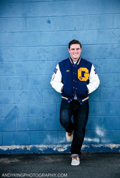 Cool Senior Portraits Varsity Jacket Senior Pictures Guys, Letterman Jacket Senior Pictures Boys, City Senior Picture Ideas Guys, Guy Senior Pictures Poses High Schools, Senior Football Photography, Letterman Jacket Pictures, Tennis Senior Pictures, Andy King, Varsity Jacket Outfit