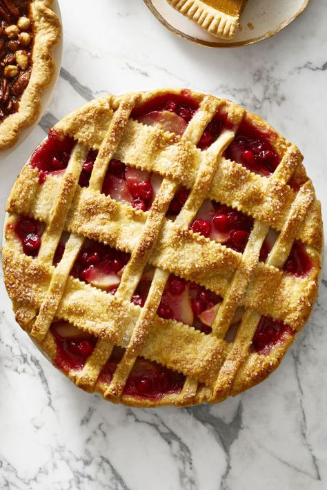 Cranberry-Pear Lattice Pie: Cranberry sauce for dinner and cranberry pie for dessert — now that's one way to get your daily dose of fruit. Click through for more incredible Thanksgiving desserts. Christmas Dessert Pie, Cranberry Pear Pie, Thanksgiving Desserts Pie, Fresh Cranberry Recipes, Delicious Thanksgiving Desserts, Pie Ideas, Lattice Pie, Easy Dessert Recipes Christmas, Cranberry Dessert