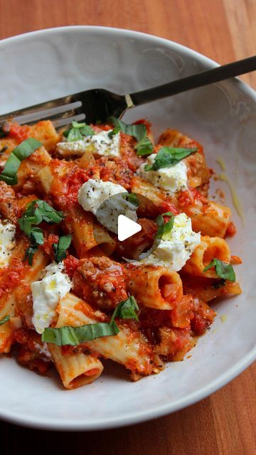 Kristen Faith on Instagram: "Tomato Basil Rigatoni with Burrata 🍝  Recipe on my Substack! Link in bio 🔗  Olive oil: @getgraza  Rigatoni: @raoshomemade  Sausage: @angelocaputosfreshmarkets   #tomatobasilsauce #rigatoni #pastarecipe #recipe #springrecipe #burrata #yum" Rigatoni Burrata, Rigatoni With Sausage And Tomato Cream Sauce, Rigatoni With Roasted Cherry Tomatoes And Burrata, Creamy Tomato Rigatoni, Bursting Tomato Burrata Pasta, Sausage Rigatoni, Burrata Recipe, Rigatoni Recipes, Tomato Basil Sauce