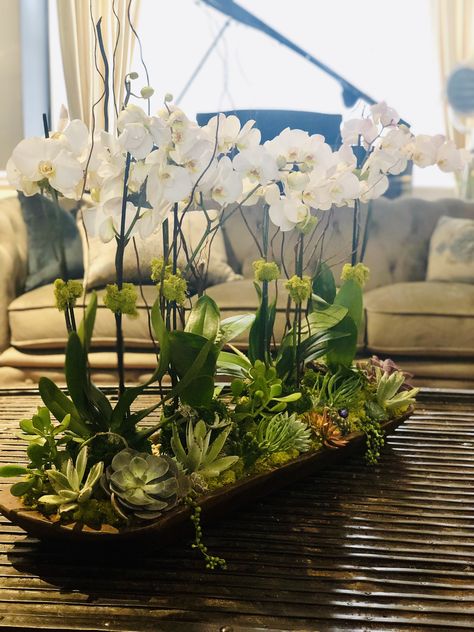 Orchids and succulents in a rustic dough bowl. Orchids And Succulents Arrangements, Orchid Decor Ideas, Orchids Arrangements Ideas, Orchid Interior Design, Orchids And Succulents, Orchid Bowl, Orchid Interior, Hotel Flower Arrangements, Orchid Flower Arrangements