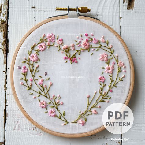 DESCRIPTION Create something beautiful for your loved one this season with this Dainty Floral Heart Wreath hand embroidery pattern! Perfect for seasonal decor and embroidery enthusiasts. Get your hoop ready and let's stitch up some floral magic with this delightful embroidery project! Happy stitching! This listing is for a digital PDF pattern, which includes: ~ Printable pattern scaled to fit 3" to 8" hoops ~ Beginner's Guide to Hand Embroidery with a FREE sample pattern ~ Beginner's Guide avail Pink Floral Embroidery, Flower Heart Embroidery, Embroidery Designs For Love, Floral Heart Embroidery Pattern, Hand Embroidery Projects Free Pattern, Floral Embroidery Patterns Free, Heart Embroidery Patterns, Hand Embroidery Patterns Free Printable, Embroidery Heart Pattern