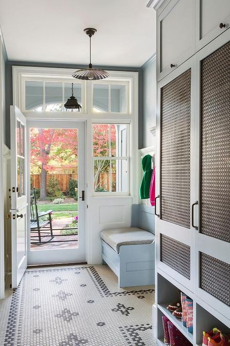 Powder blue mudroom features powder blue locker cabinets fitted with metal grille cabinet doors stacked atop powder blue shoe shelves. Room Tiles Design, Transitional Entry, Laundry Room Tile, Southern Colonial, Creative Tile, Mudroom Design, Room Tiles, Laundry Mud Room, Ikea Pax