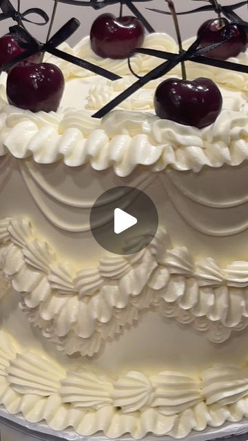 Savannah on Instagram: "Decorate a vintage cake with me🍒🎀  Piping tips used:   Drop lines #2 Swags #12  Side ruffles #103  Top and bottom ruffles #104  Small shell borders #12  Large shell borders #22  Bows on cherries inspired by @velvetvalleycakes   #cakedecorating #cakedecorator #vintagecake #buttercreampiping #pipingtips #coquette #coquetteaesthetic #bows" Large Cake Designs, Ruffle Heart Cake, Vintage Cake Piping Techniques, Vintage Cake Piping Tips, Vintage Piping Cake, Ruffled Wedding Cake, Cake Piping Techniques, Vintage Pasta, Ribbon Cake