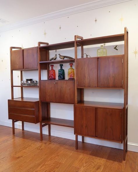 Mod Factory ✨ on Instagram: "SOLD ✅ Vintage Walnut Freestanding Wall Unit made in Yugoslavia. Excellent restored vintage condition. Features two standard cabinets, a secretary desk in the center, a chest of drawers, four shelves, and a record cabinet. This unit is finished on the back, so it can be utilized as a room divider. 87"W x 16.5"D x 73"H Available for purchase on our website (linked in our bio)." Mcm Shelving Wall Units, Mcm Secretary Desk, Mcm Wall Unit, Compact Furniture, Desk Units, Record Cabinet, Mcm Design, Free Standing Wall, Secretary Desks