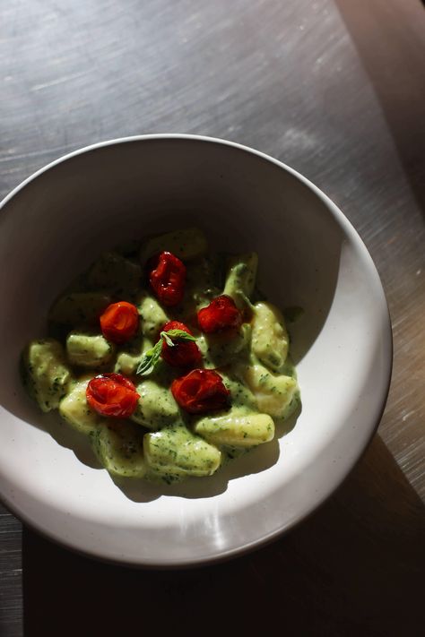 Creamy Pesto Gnocchi — theredbowl Creamy Pesto Gnocchi, Pesto Gnocchi, Tomato Confit, Creamy Tortellini Soup, Pizza Dinner, Potato Ricer, Yellow Potatoes, Creamy Pesto, Parmesan Pasta