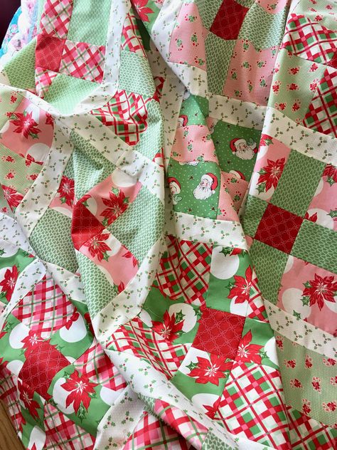 Uneven 9-Patch Quilt Pattern featuring Swell Christmas Christmas Scrap Quilt Patterns, Scrappy Christmas Quilt Patterns Free, Easy Christmas Quilt, Christmas Lap Quilt, Swell Christmas, Santa Quilt, Christmas Quilting Projects, Christmas Quilt Blocks, Pink Quilt