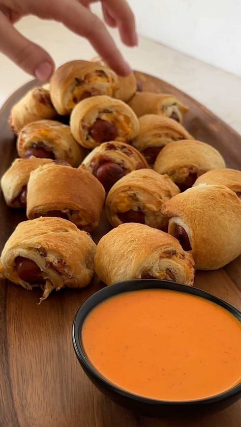 Jalapeño Popper Pigs in a Blanket Recipe | Crate & Barrel Jalepeno Popper Lil Smokies, Popper Pigs In A Blanket, Pigs In A Blanket Recipe, Lil Smokies, Cocktail Sausages, Jalapeno Popper, Thick Cut Bacon, Spicy Dishes, Pigs In A Blanket