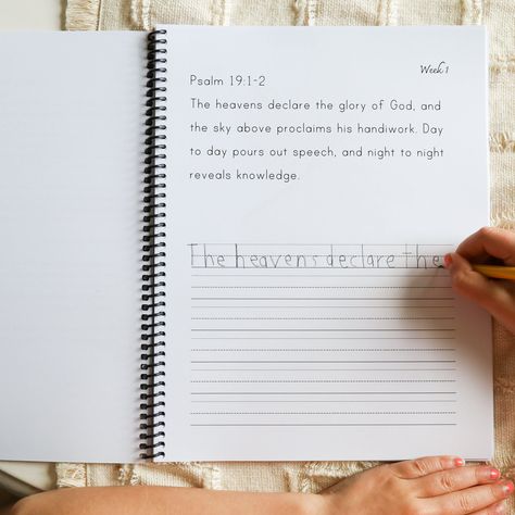 This student copywork book is designed to be used in conjunction with the Morning Time plans. Each week, you’ll find two copywork pages: one with the weekly Scripture memory verse, and the other with the poem’s artwork and a space to choose a favorite line from the poem or read-aloud to copy. For older students, you could use the blank space for dictation or narration. Why do we use copywork? Copywork is not only useful for handwriting practice, but for learning proper grammar, subject/verb agre Scripture Memory For Kids, Homeschool Setup Small Spaces, Cozy Homeschool Room, Proper Grammar, Weekly Scripture, Homeschool Room Design, Homeschool Preschool Activities, Toddler Homeschool, Morning Time