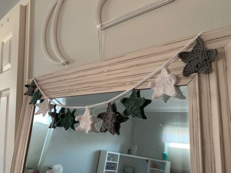 image of a crocheted star garland inspired by taylor swift’s folklore album Folklore Stars, Crochet Star Garland, Bedroom Crochet, Crochet Room, Stars Garland, Crochet Fairy, Easy Crochet Animals, Crochet Stars, Crochet Decoration