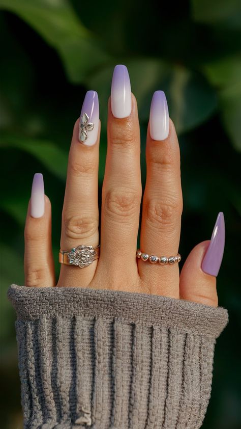 -Embrace tranquility with this stunning lavender ombre nail design! The soft gradient blends shades of lavender into a delicate finish, creating a calming and chic look. Perfect for springtime or any occasion that calls for a splash of color, these nails exude elegance and creativity. Pair them with pastel outfits for a fresh, harmonious vibe! 💜✨ #OmbreNails #LavenderNails #NailArtInspiration Lavender Ombré Nails, Lilac Ombre Nails, Lavender Ombre Nails, Silver Ombre Nails, Ombre Nail Design, Lavender Ombre, Pastel Outfits, Soft Gradient, Shades Of Lavender