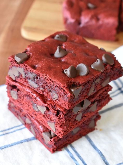 are sure to be your new favorite brownie recipe. With just a handful of ingredients, you can have the most delicious red velvet brownies with an amazing fudgy texture!  Make this delicious cake with this  highly recommended red velvet cake  mix that Amazon reviewers swear by! This red velvet brownies recipe is a game changer. By using a box of red velvet cake mix as the base, you're saving time without lacking flavor.For more delicious brownie recipes try my Peanut Butter Brownie Cup… Red Velvet Box Recipes, Red Velvet Box Brownies, Red Velvet Box Mix Recipes, Recipes With Red Velvet Cake Mix Boxes, Red Velvet Brownies From Box Cake Mixes, Red Velvet Cake Mix Recipes, Brownies With Chocolate Chips, Oreo Truffle Brownies, Red Velvet Brownies Recipe