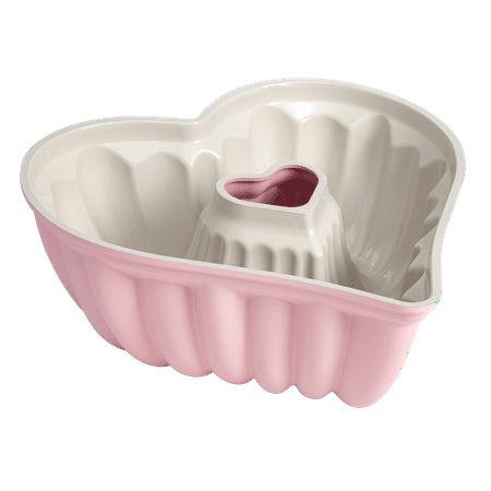 Bake with love using this pink heart-shaped fluted cake pan from Paris Hilton - a must-have for any baking enthusiast! Whether it's a special occasion or just because, this pan will take your desserts to the next level, making them look and taste simply amazing. The fluted edges create a heart-shaped design that's perfect for cakes, breads, and even gelatin desserts. Made with heavy-duty cast aluminum, this baking pan ensures even heating for perfectly baked goods every time. The Clean Ceramic n Stainless Steel Bakeware, Heart Shaped Cake Pan, Heart Shaped Cakes, Bakeware Set, Pink Kitchen, Cute Kitchen, Clean Dishwasher, Cake Pan, Ceramic Coating