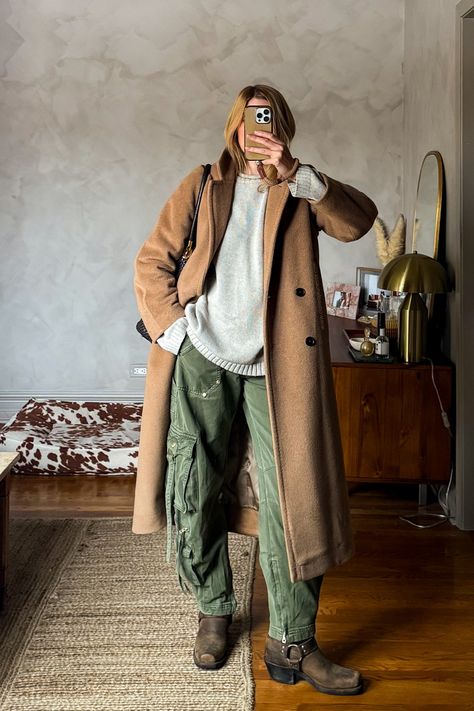 Paired my favorite Gap x Cult Gaia barrel cargo pants with a thrifted oversized sweater, a camel wool overcoat, and vintage Frye harness boots and a thrifted woven leather bag for an easy fall/winter cozy layered outfit. #tomboyfemme #tomboystyle #barreljeans #winteroutfits #falltrends #winterlayering #winterfashiontrends #fryeboots • how to style barrel jeans • how to style cargo pants • earth tone outfit ideas • cozy outfits • oversized outfits • womens fashion • fall winter style trends • Cozy Wfh Outfit, Arizona In January Outfits, Winter Outfit Cowboy Boots, Bozeman Montana Winter Outfits, L L Bean Boots Outfits, Wool Shacket Outfit, Utah Travel Outfit, Frye Harness Boots Outfit, Oversized Cargo Pants Outfit