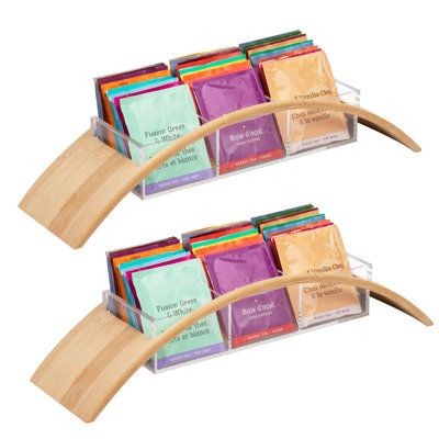 This set of tea caddies displays all of your favorite tea flavors so that you can throw out those bulky tea boxes. With 3 sections and a holding capacity of 36 (12 tea bags per section) tea bags, you can conveniently see your options without rifling through dozens of drawers and tea boxes, saving time and energy. Its neutral design, and food-safe materials, make it perfect for all-time countertop storage, so you have everything you need close to your tea kettle without sacrificing your kitchen a