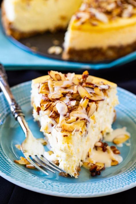 Amaretto Cheesecake White Chocolate Amaretto Cheesecake, Almond Amaretto Cheesecake, Amaretto Cheesecake, Amaretto Cream, Amaretto Cake, Almond Flavor, Vanilla Wafers, Bake Sale, Sliced Almonds