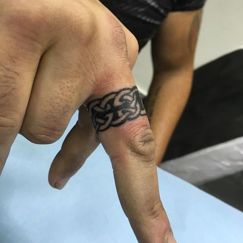 Celtic ring tattoo by Naor Cohen @Naortattoos Ring Tattoo For Men, Celtic Ring Tattoo, Wedding Ring Tattoo For Men, Wedding Ring Finger Tattoos, Tattoo Rings, Ring Tattoo Designs, Wedding Band Tattoo, Tattoo Wedding, Ring Tattoo