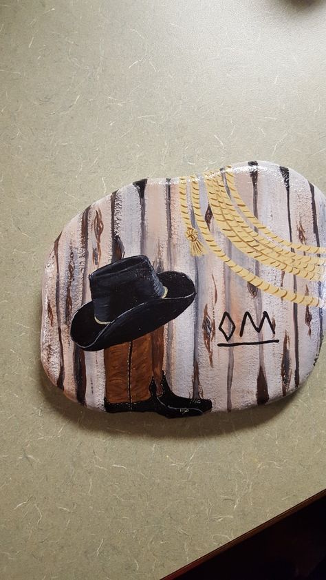 Cowboy hat and boots painted rock Cowboy Painted Rocks, Horse Rock Painting Ideas, Western Painted Rocks, Western Rock Painting Ideas, Rock Creations, Decorative Rocks, Rock Animals, Rock Designs, Western Stuff