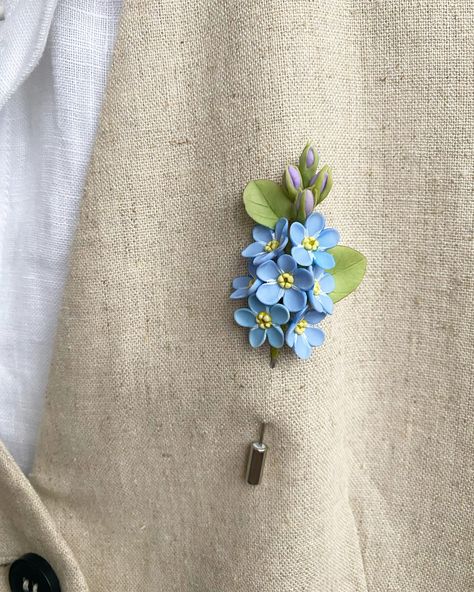 This  wedding is fully handmade. Each element (flower, petal or leaf) is made entirely by hands from material called cold porcelain and toned with soft pastel. These flowers look much like fresh flowers but they will never fade. This blue flower wedding lapel pin is absolutely unique and perfect for weddings and other celebrations. But also it will be good even as casual accessory. Flowers are tender and delicate. length - 3,1 inches (8 cm) Care: You should treat with care this product. If it is dirty, do not worry. Just wipe with a slightly damp cloth. Delivery: All products are securely packed in special containers to avoid any damage during delivery. You will get your flower accessory in nice gift box. I will gladly make something special for you. Feel free to ask me for personal custom Blue Flower Wedding, Wedding Lapel, Lapel Pins Wedding, Flower Lapel, Flower Resin Jewelry, Idee Pasto, Flower Lapel Pin, Lapel Pins Mens, Groom Boutonniere