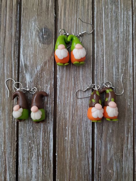 These beautiful fall gnome earrings are for anyone. This is great for fall and great for Thanksgiving. These earrings make great gifts for anyone! Clay gnome dangle earrings. Small size. Cute earing perfect gift. - Clay - Silver earring hooks to order 1. Choose which color gnome number are in picture. Second picture  2. place order 3. wait and receive to enjoy Polymer Clay Kunst, Gnome Earrings, Handmade Gnomes, Fall Gnome, Beads Craft Jewelry, Polymer Clay Diy, Polymer Clay Jewelry Diy, Clay Earring, Clay Jewelry Diy