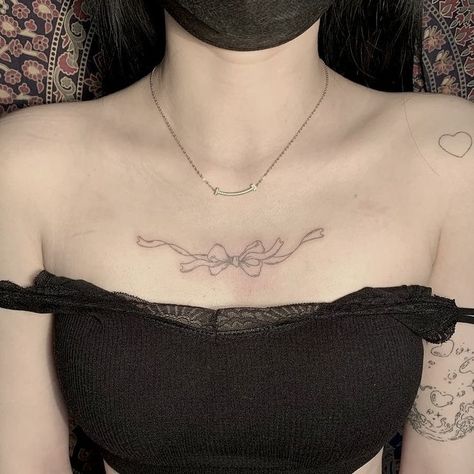 Chest Tattoo Aesthetic, Cliche Tattoo, Bow Tattoos, Under Chest Tattoo, Ribbon Tattoos, Bow Tattoo, Kawaii Tattoo, Cute Little Tattoos, Sternum Tattoo