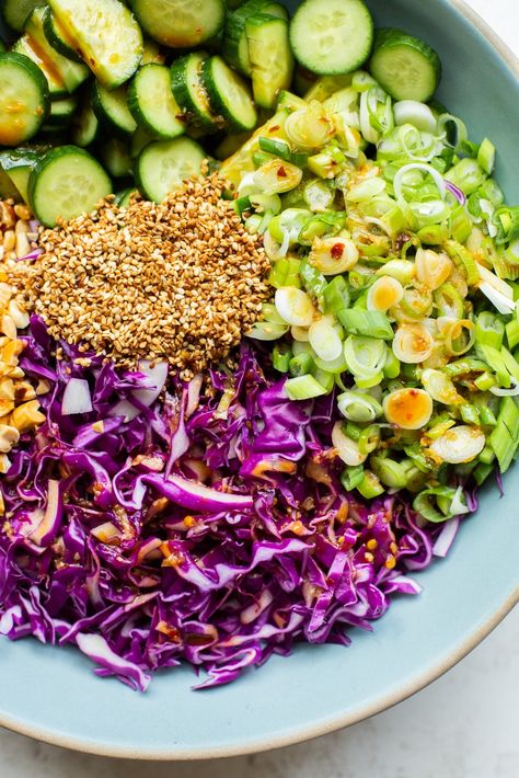 This Cabbage Cucumber Salad is crunchy, refreshing, and easy to make ahead of time! It's loaded with sesame seeds and green onions and tossed in an irresistibly delicious miso sesame dressing. It makes for the perfect stir-fry side dish, or add some protein and rice to make it a main dish! Cabbage Cucumber Salad, Dumpling Dipping Sauce, Asian Diet, Vegetarian Thai, Cabbage Rice, Make Ahead Salads, Sesame Dressing, Asian Salad, Persian Cucumber