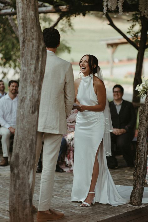 A chance meeting at the gym and late night bite at a bodega in Austin, TX led to a beautiful wedding in the Blue Ridge Mountains of Asheville, NC. ⁠The Goldie gown was the first gown Carrie tried on and "the material felt luxurious without being too much. It felt like me," she shares.⁠

#Gracebride Carrie's Wedding Blog is now live!🤍 

Photography by @stratmanimagery⁠ 
⁠
#graceloveslace #satinweddingdress #halterneckweddingdress #highneckweddingdress #openbackweddingdress #weddingdress Goldie Grace Loves Lace, Sienna Grace Loves Lace, Rosa Grace Loves Lace, Oceania Grace Loves Lace, Goldie Dress Grace Loves Lace, Halterneck Wedding Dress, Elegant Mermaid Wedding Dress, Wedding Dress 2024, High Neck Wedding Dress