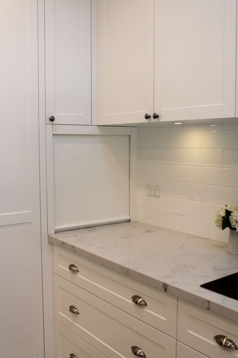 Kitchen - Roller Door Appliance Cupboard.  Used the "dead" corner of the kitchen for the appliance cupboard, but used area above appliance cupboard and below bench as storage shelves and drawers accessed from the WIR on the other side of the wall.  A much better use and more accessible way to use this space. Doors For Kitchen Cabinets, Kitchen Corner Cupboard, Doors For Kitchen, Kitchen Cabinets Color Combination, Kitchen Sink Window, Kitchen Table Lighting, Roller Door, Tambour Doors, Appliance Cabinet