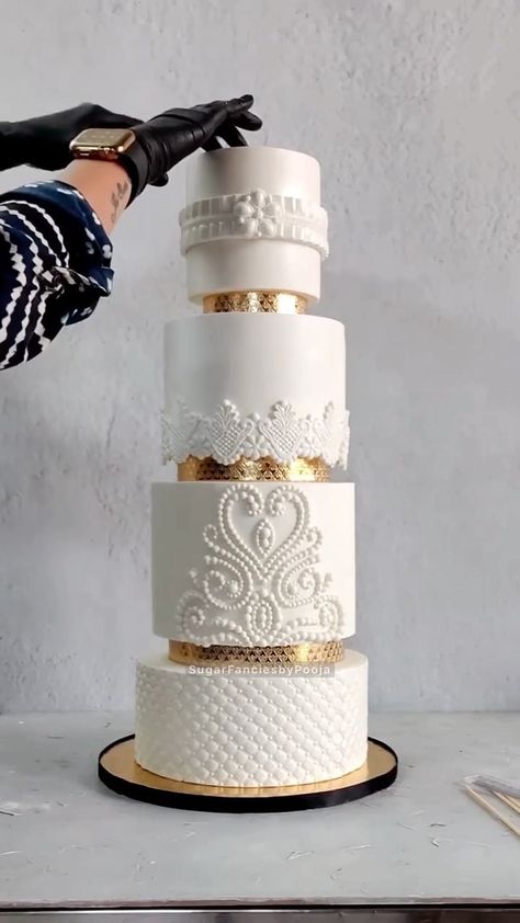 cakesbae on Instagram: White & Gold Wedding Cake ‼️😋 🎥 by @sugarfanciesbypooja #cakesbae #dessertbae #foodporn #bananabostoncreamcake #cakevideo… 4tier Wedding Cake, Coronation Cake, 5 Tier Cake, Faux Wedding Cake, Gold And White Wedding Cake, Scroll Wedding Cake, Modern Wedding Cake Designs, 4 Tier Cake, Classy Wedding Cakes