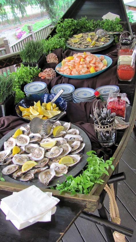 Seafood Buffet in a Canoe Seafood Party Ideas For Birthday, Oyster Roast Party Ideas, Seafood Picnic, Seafood Party Food, Oyster Roast Party, Picnic Buffet, Clam Bake Party, Oyster Party, Bake Shrimp