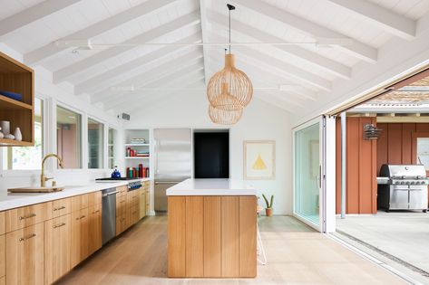 Continuum from interior to exterior. A 1950s California Ranch House Gets a Modern-Farmhouse Makeover - Dwell California Ranch House, 1950s California, Vaulted Ceiling Kitchen, Ranch House Remodel, Ranch Remodel, California Ranch, California Modern, Modern Ranch, Ranch Style Homes