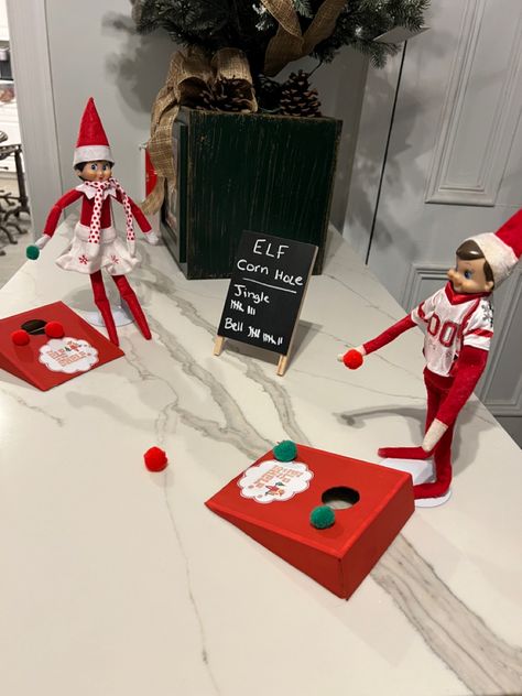 Elf On The Shelf Pinata, Elf Cornhole, Elf On The Shelf Easy, Elf Stuff, Elf Shenanigans, Napkin Folding Ideas, Thanksgiving Aesthetic, Funny Elf On The Shelf, Fireplace Tv Wall Decor